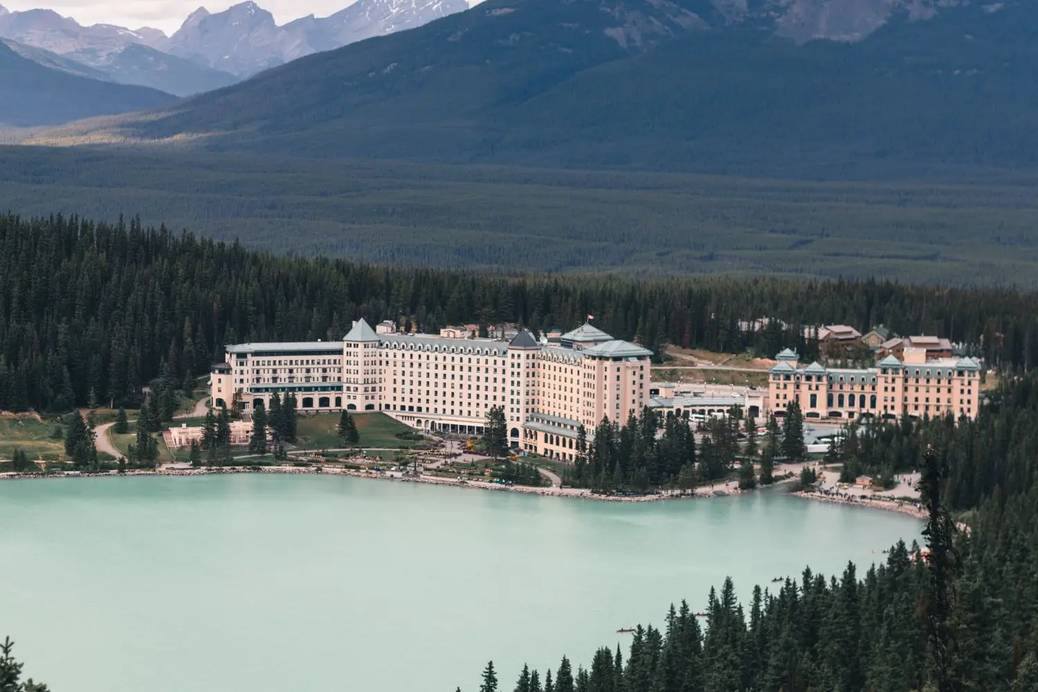 Canadian mountain resort beside a turquoise lake