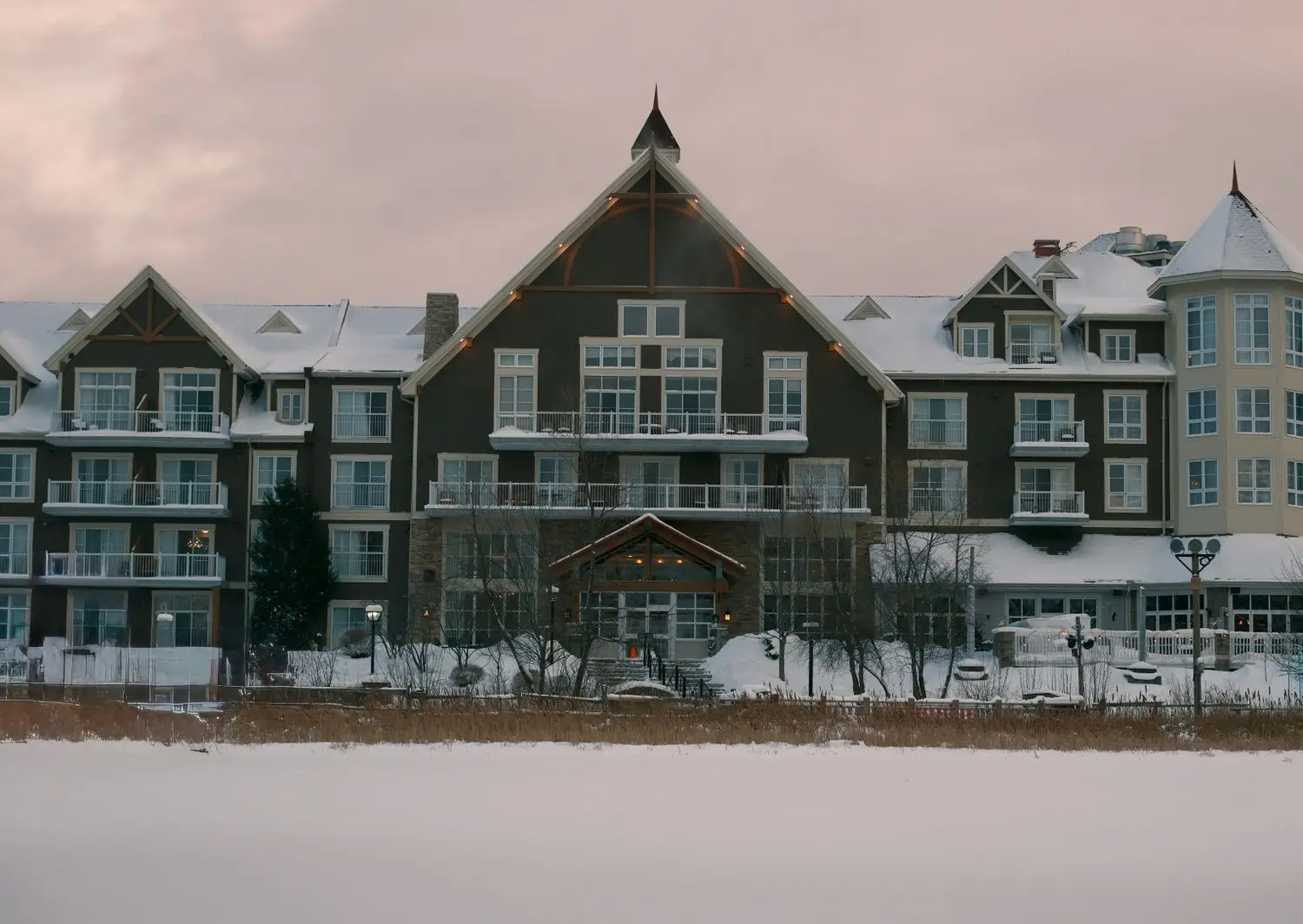 Canadian resort hotel in misty mountain landscape