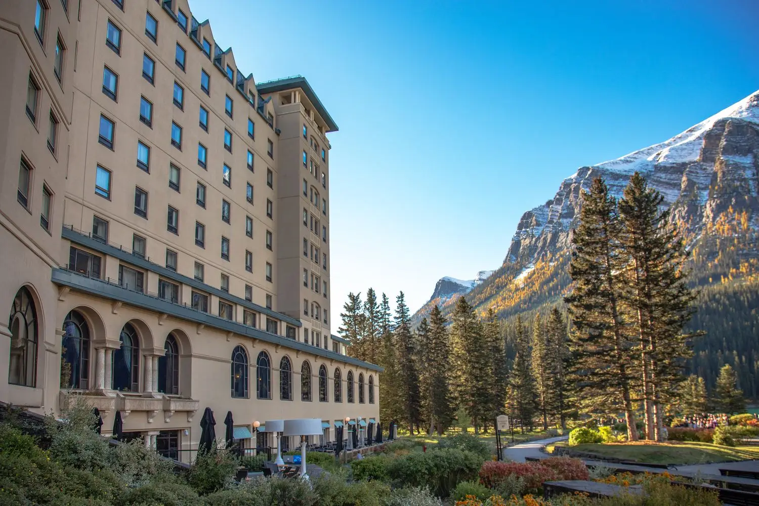 Canadian mountain hotel with dramatic alpine backdrop